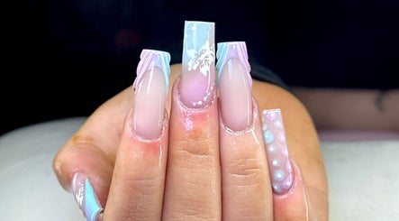 Elegant nail art at Nailsbylilsrose Raydiance 2 in Gorleston-on-sea, England, GB. Intricate pastel and floral designs.