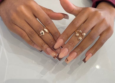 Elegant nail design at BN STUDIO, Coventry, England, GB, showcasing trendy brown and nude nail art.