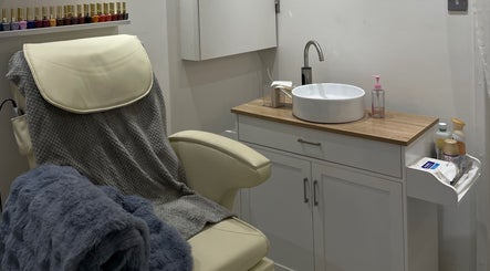 Relaxing massage chair and sink area at BN STUDIO, Coventry, England, GB, designed for premium comfort.