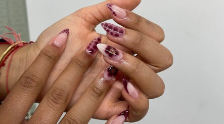 Stylish nail art with plum and pink ombre at BN STUDIO, Coventry, England, GB.