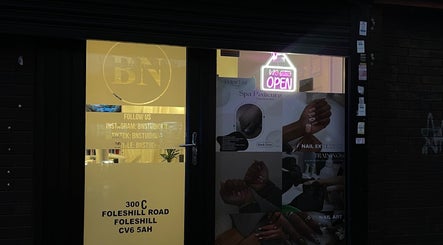 Bn Studio entrance with neon open sign, located in Coventry, England, GB.