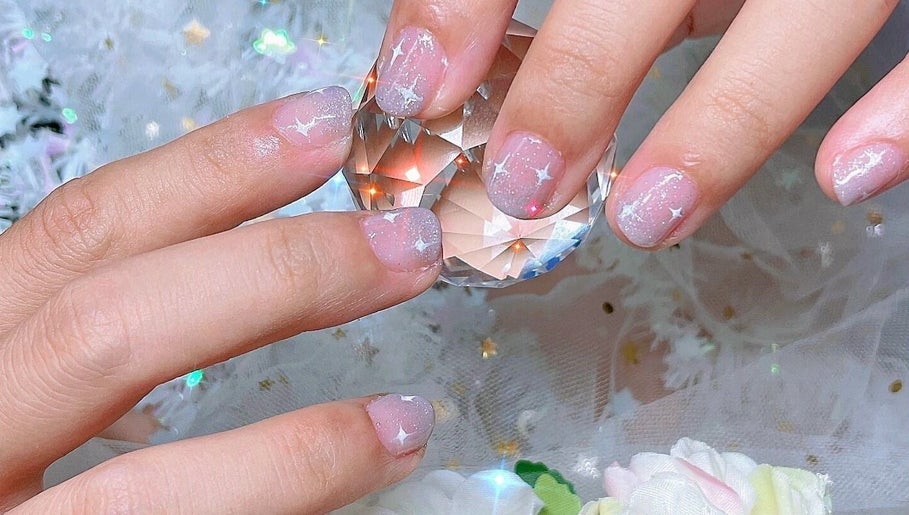 Elegant star-themed nails at Lunalili Nails in Singapore, Singapore, SG showcasing stylish artistry.