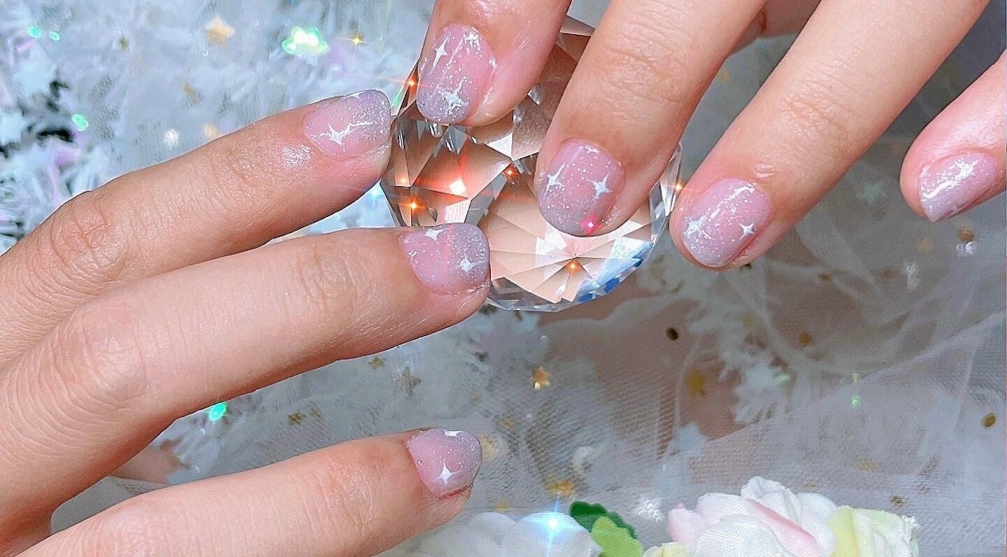 Elegant star-themed nails at Lunalili Nails in Singapore, Singapore, SG showcasing stylish artistry.