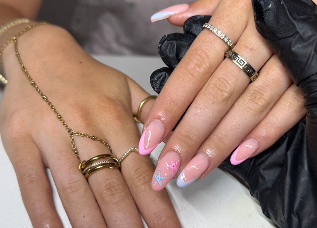 Elegant nail art with pink tips at lashedbylgx in Great Notley, England, GB.