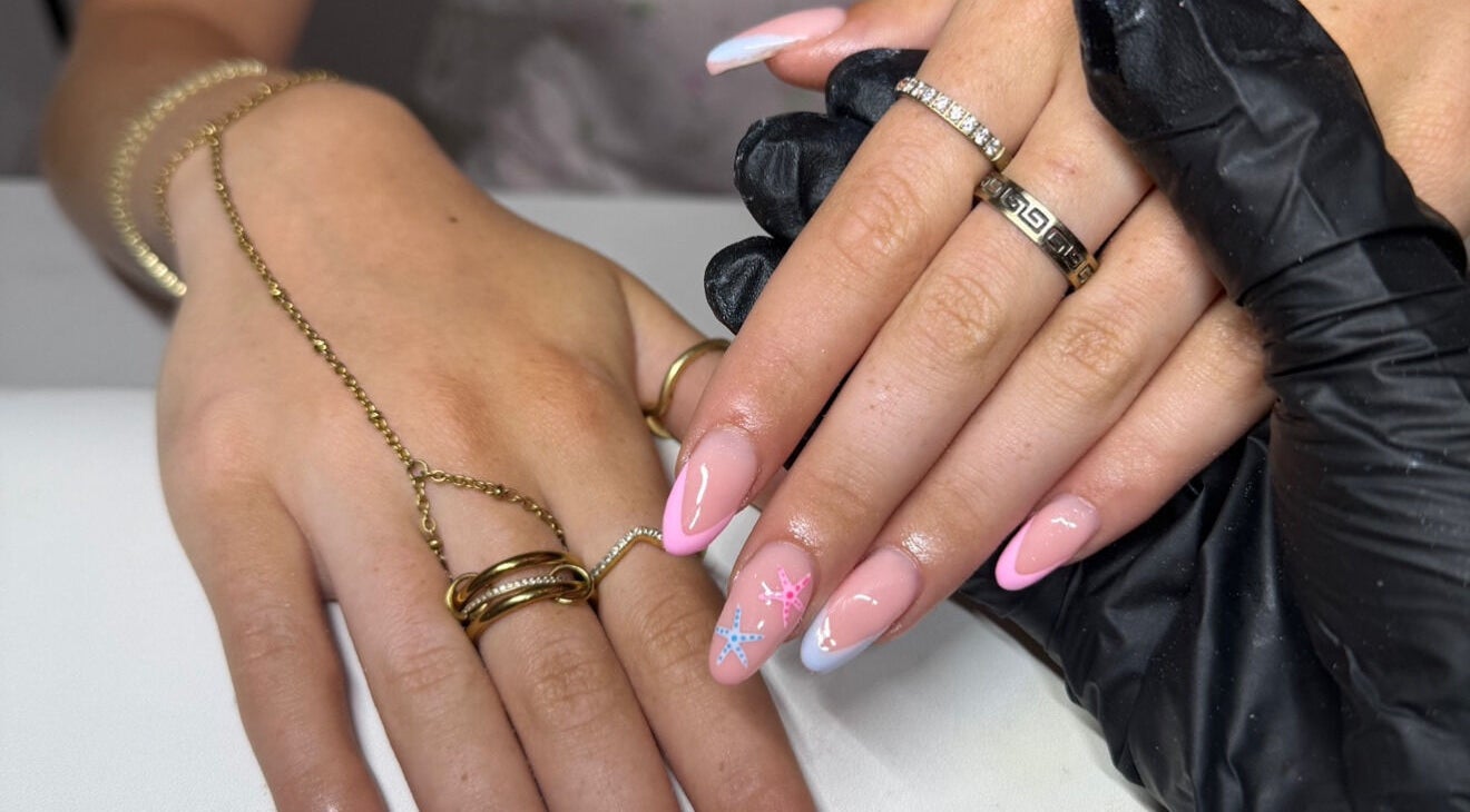 Elegant nail art with pink tips at lashedbylgx in Great Notley, England, GB.