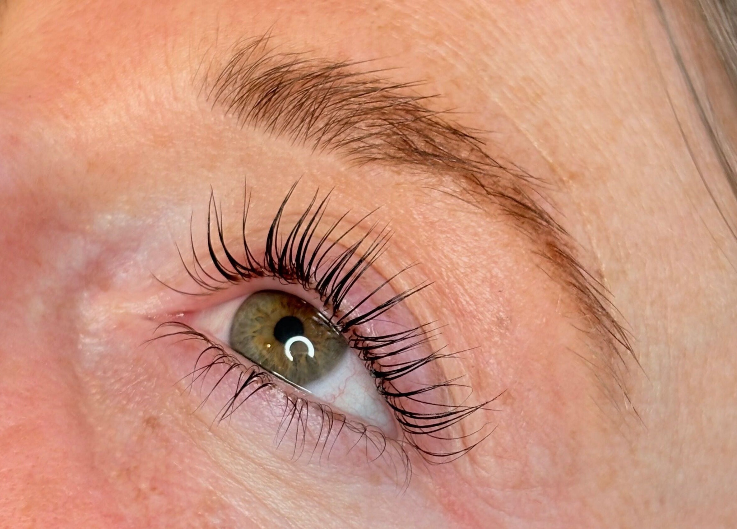 Close-up of expertly done lashes at Signature Brows, Bridgend, Wales, GB, highlighting natural beauty.