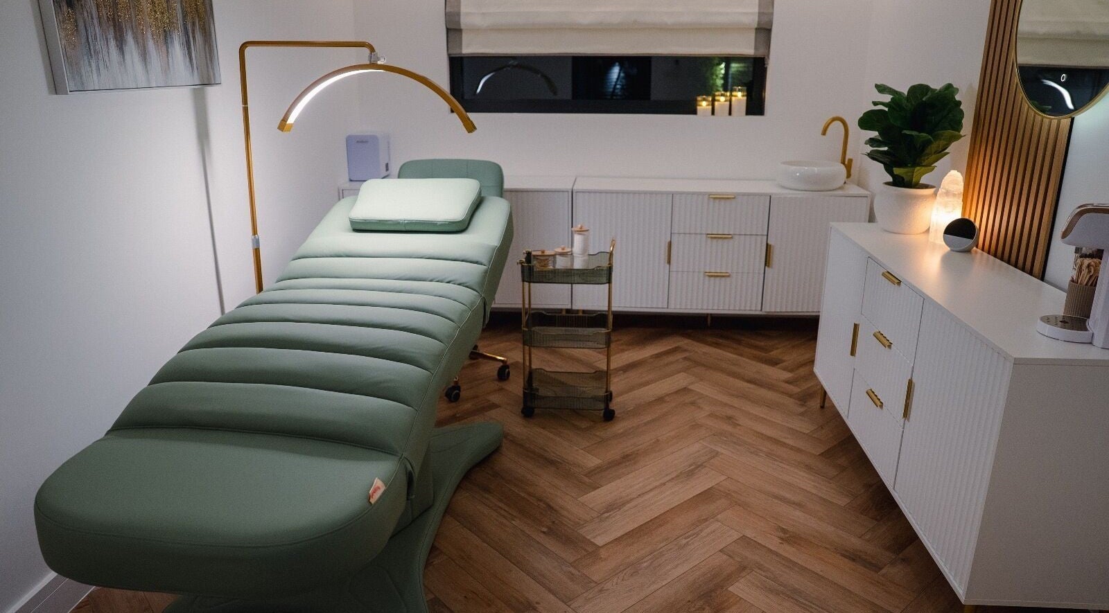 Luxurious spa room at Essential Beauty Essex - Rayleigh, Rayleigh, England, GB with a plush treatment bed.