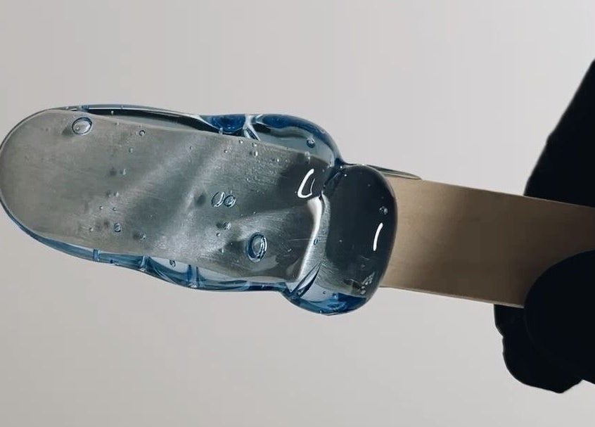 Blue sugar wax on applicator at The Sugar and Skin Lab, Oistins, Christ Church, BB.