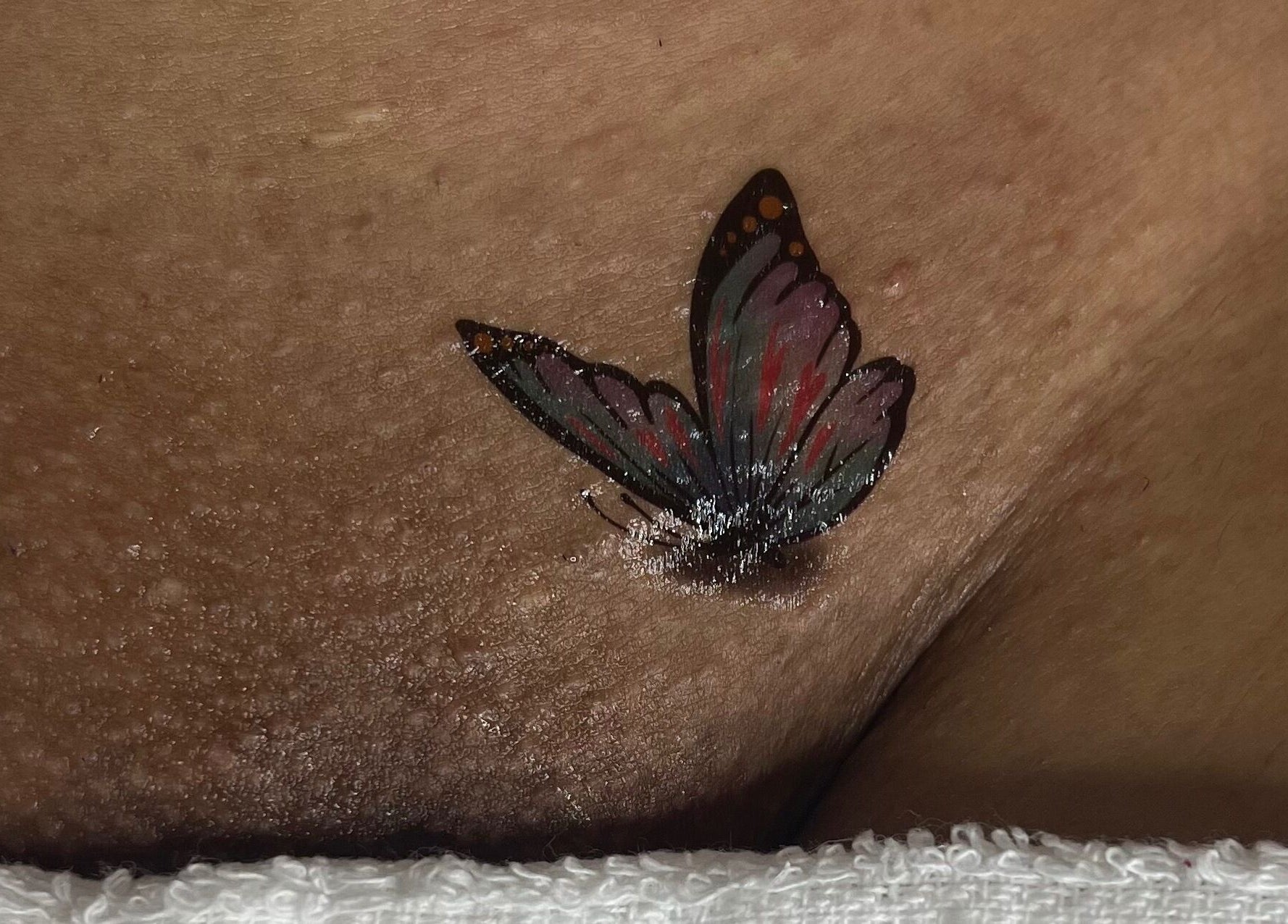Intricate butterfly body art at The Sugar and Skin Lab, Oistins, Christ Church, BB.
