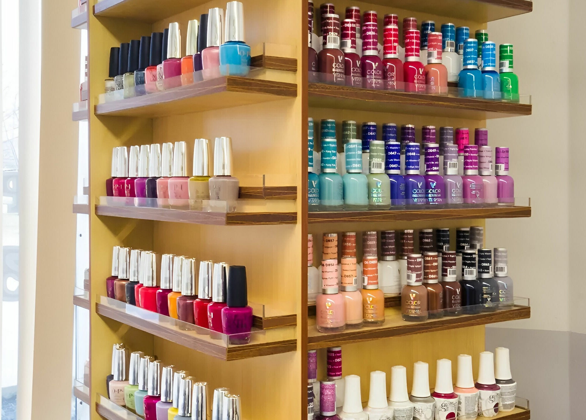 Colorful nail polish display at Gentle Nails, St. Louis, Missouri, US salon.