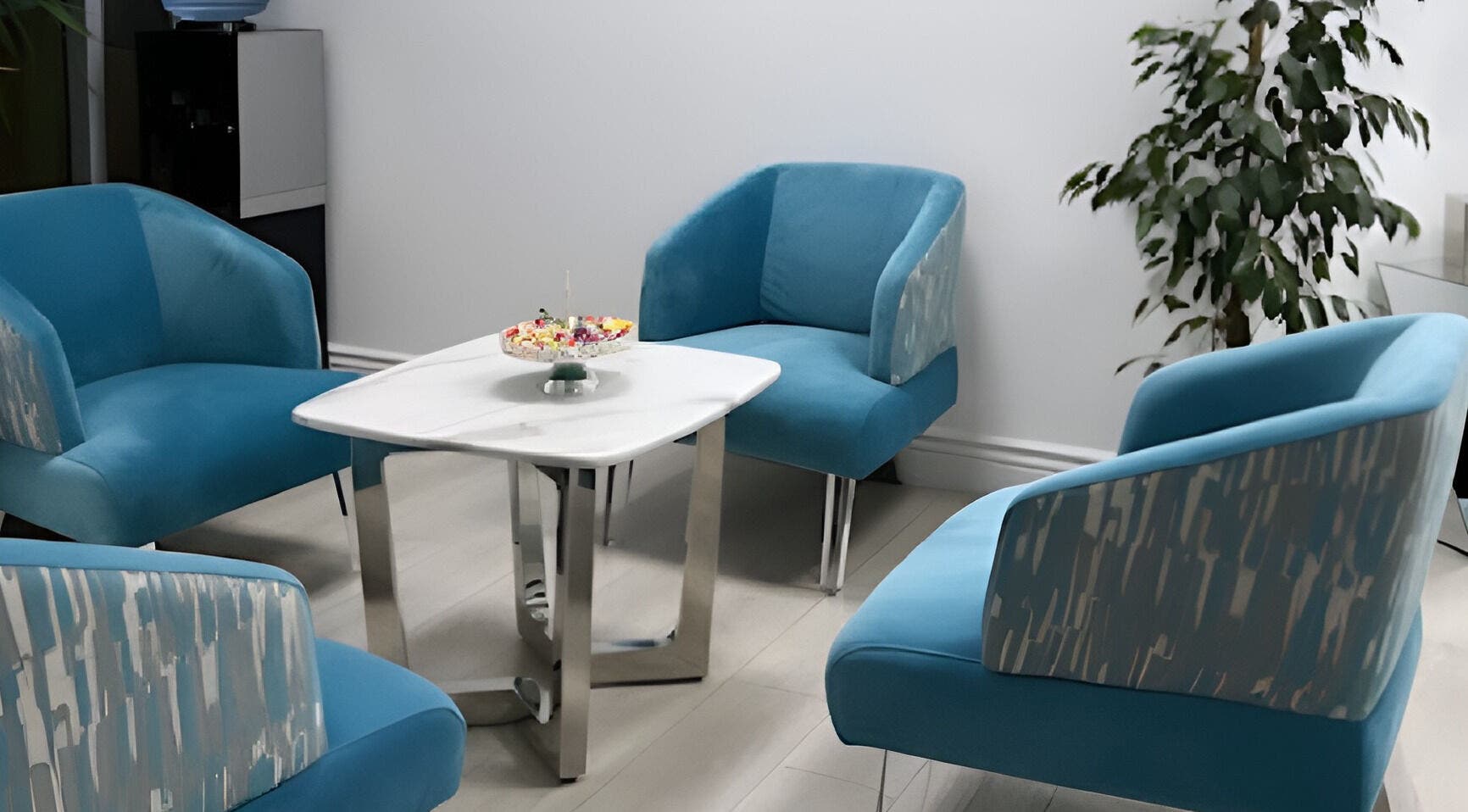 Relaxing seating area with blue chairs at Skin Masters Aesthetics Center, Lusail, Al Daayen Municipality, QA.