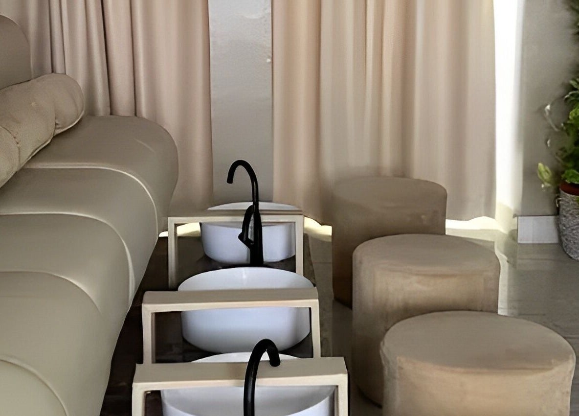Relaxing pedicure area at Hello Texture, Lekki, Lagos, NG with plush seats and elegant décor.