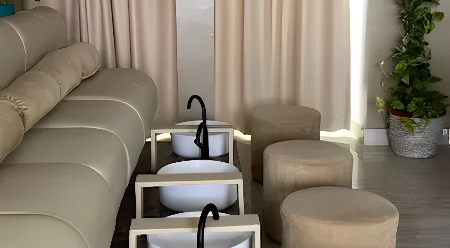 Relaxing pedicure area at Hello Texture, Lekki, Lagos, NG with plush seats and elegant décor.