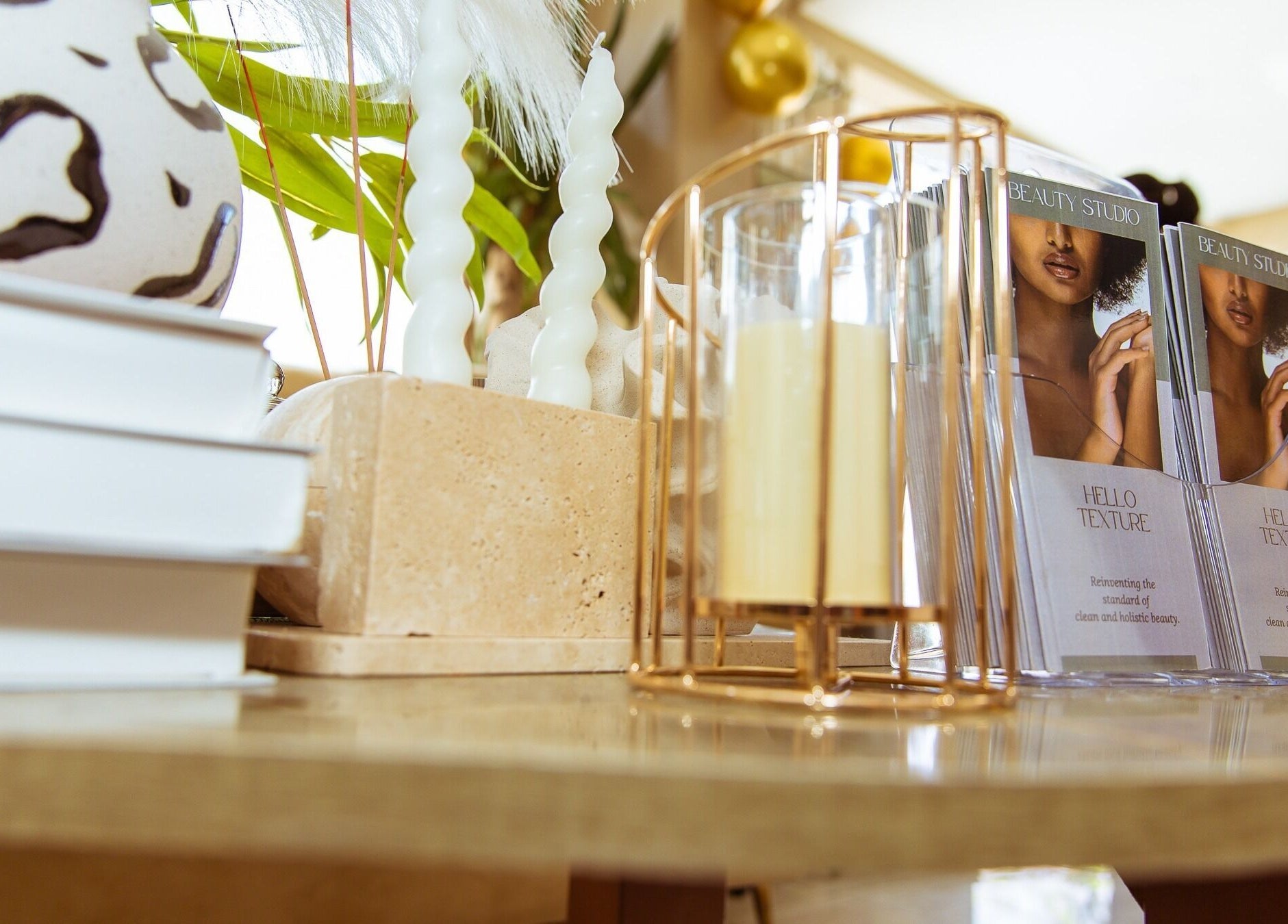 Elegant display of Hello Texture brochures at Lekki, Lagos, NG venue, showcasing beauty studio ambiance.