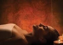 Relaxing spa experience at Designer Head Spa in Campbell, California, US with lit candles and serene ambiance.