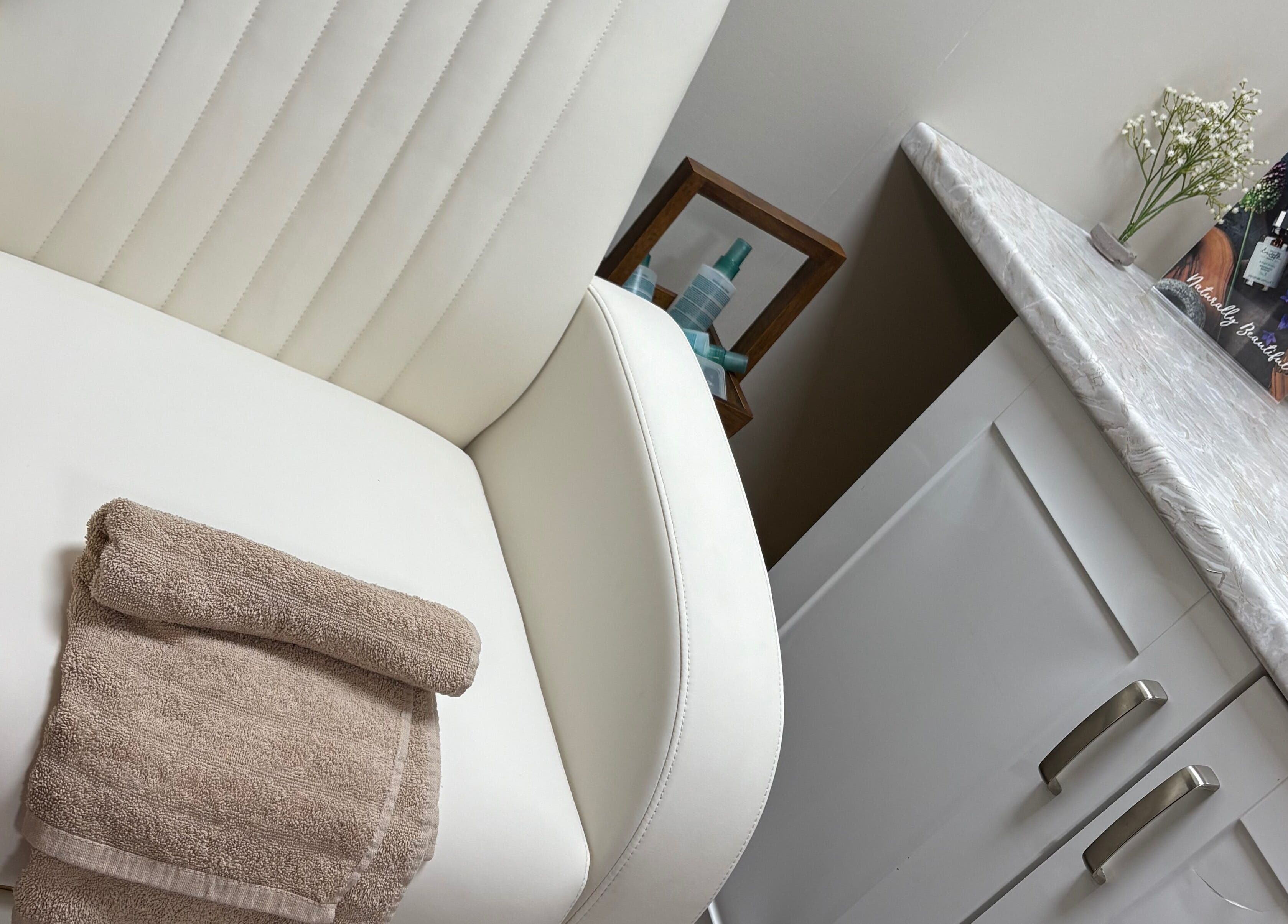 Relax Aroma spa chair with towel at Cumbernauld, Scotland, GB. Perfect serenity and pampering.