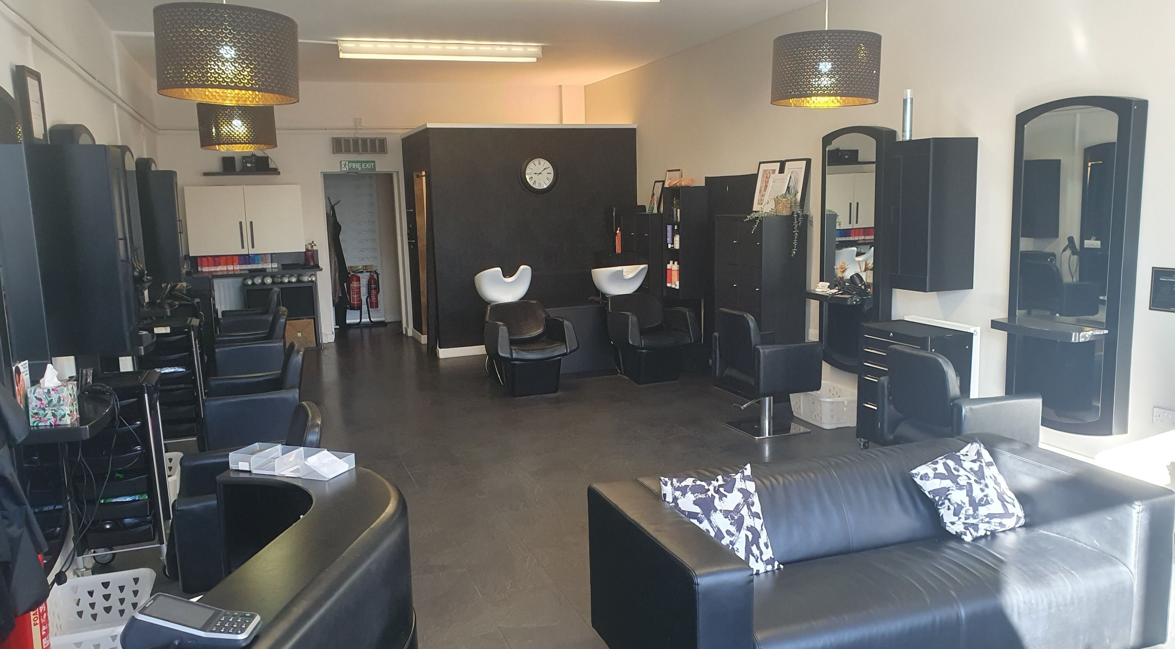 Modern interior of Emma's Cutting Edge Hair and Beauty Salon in Hucknall, England, GB, showcasing sleek design.