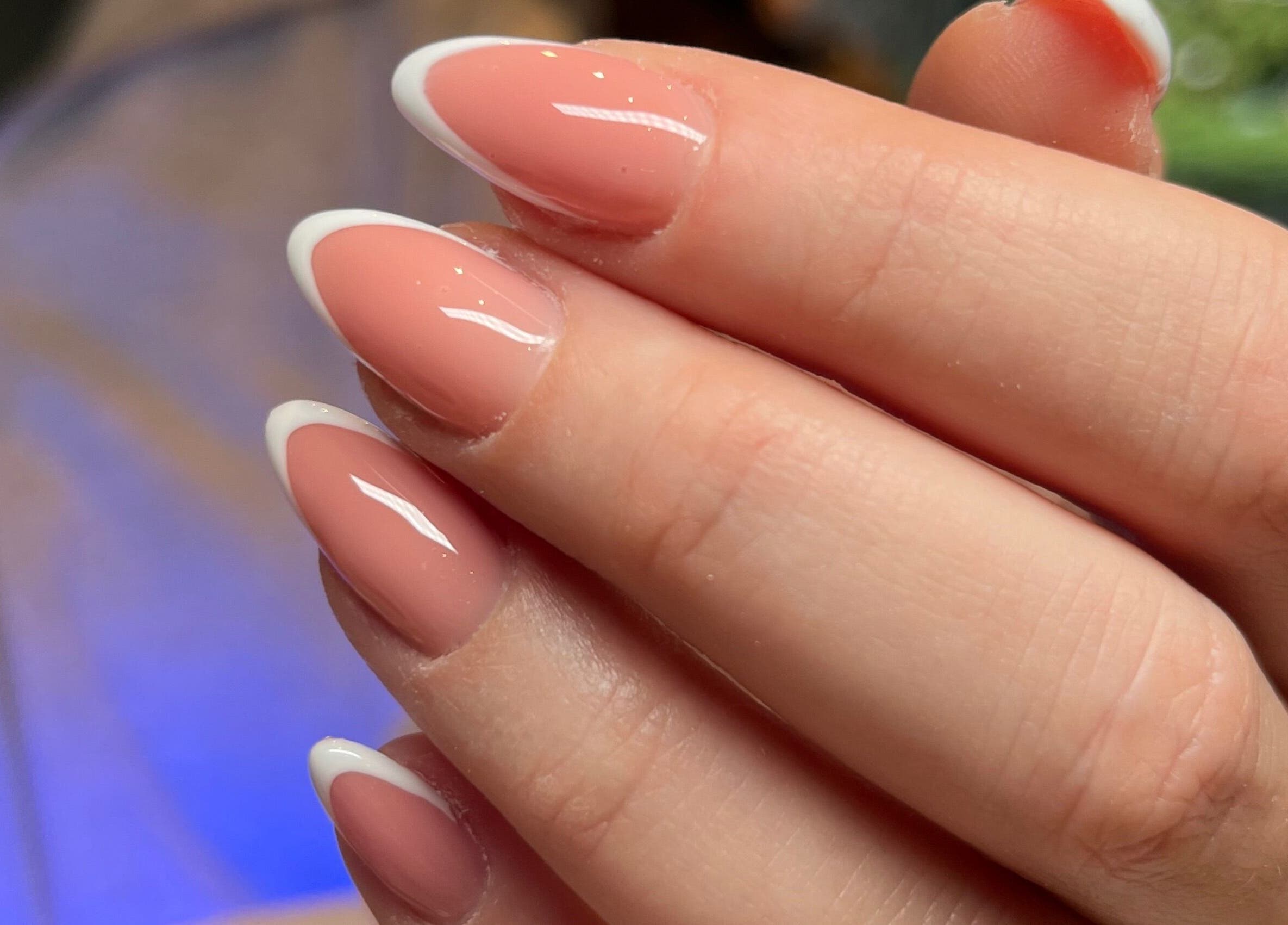 French manicure at Kilate Studio, London, England, GB, showcasing elegant nail art.