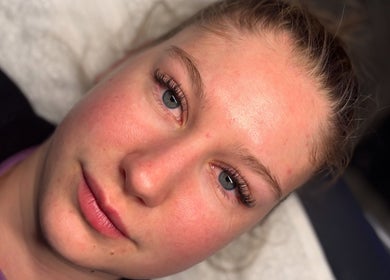 Close-up of a woman's refreshed face post-treatment at Hannaesthetics & Cosmetics, Ashton-in-Makerfield, England, GB.
