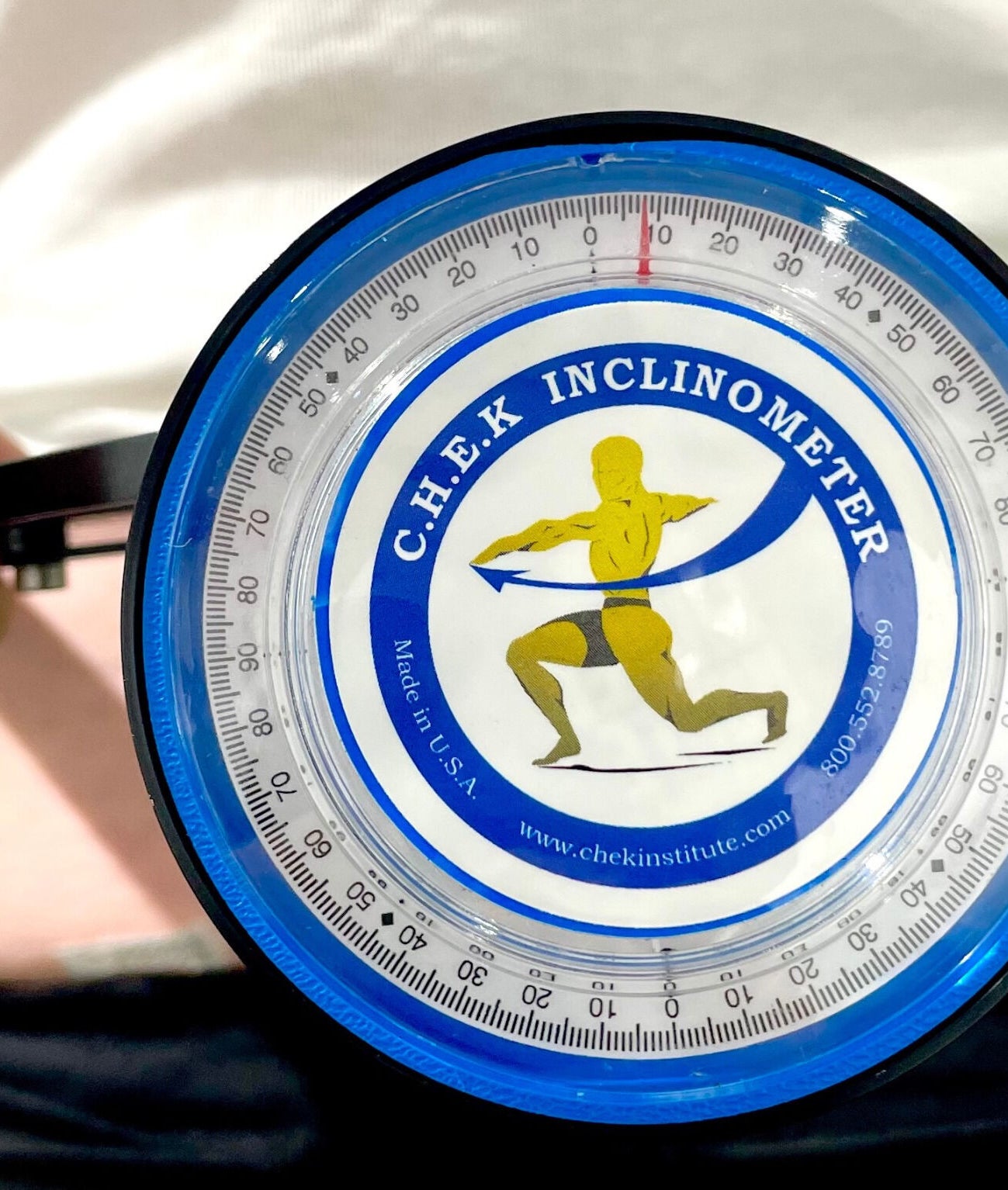 Close-up of inclinometer used for spinal assessment at Core 3 Wellness, Lostock Hall, England, GB.