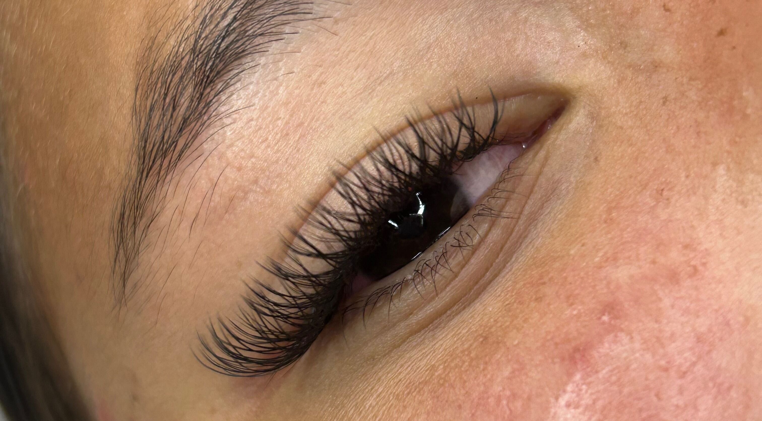 Close-up of perfectly applied eyelash extensions at S Lashbar, Cape Town, Western Cape, ZA.