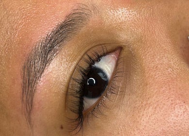 Close-up of perfectly groomed eyebrow and eye at S Lashbar, Cape Town, Western Cape, ZA.