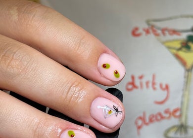 Stylish olive nail art at Sculpt Beauty Lounge, Ewloe Green, Ewloe, Wales, GB, showcasing modern manicure flair.