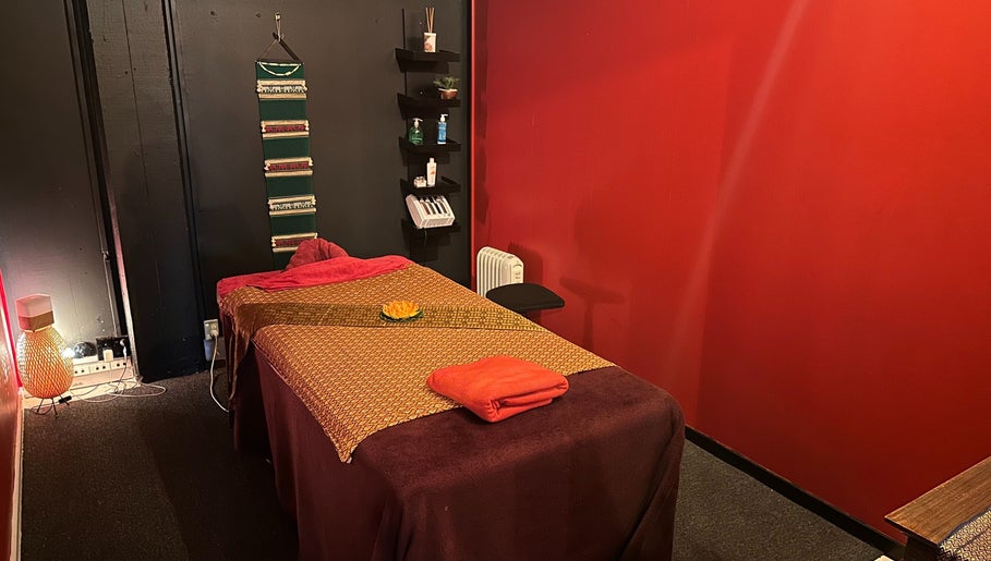 Relaxing massage room at OrientalBay Amarin Thai Massage & Spa, Wellington, Wellington, NZ with warm decor.