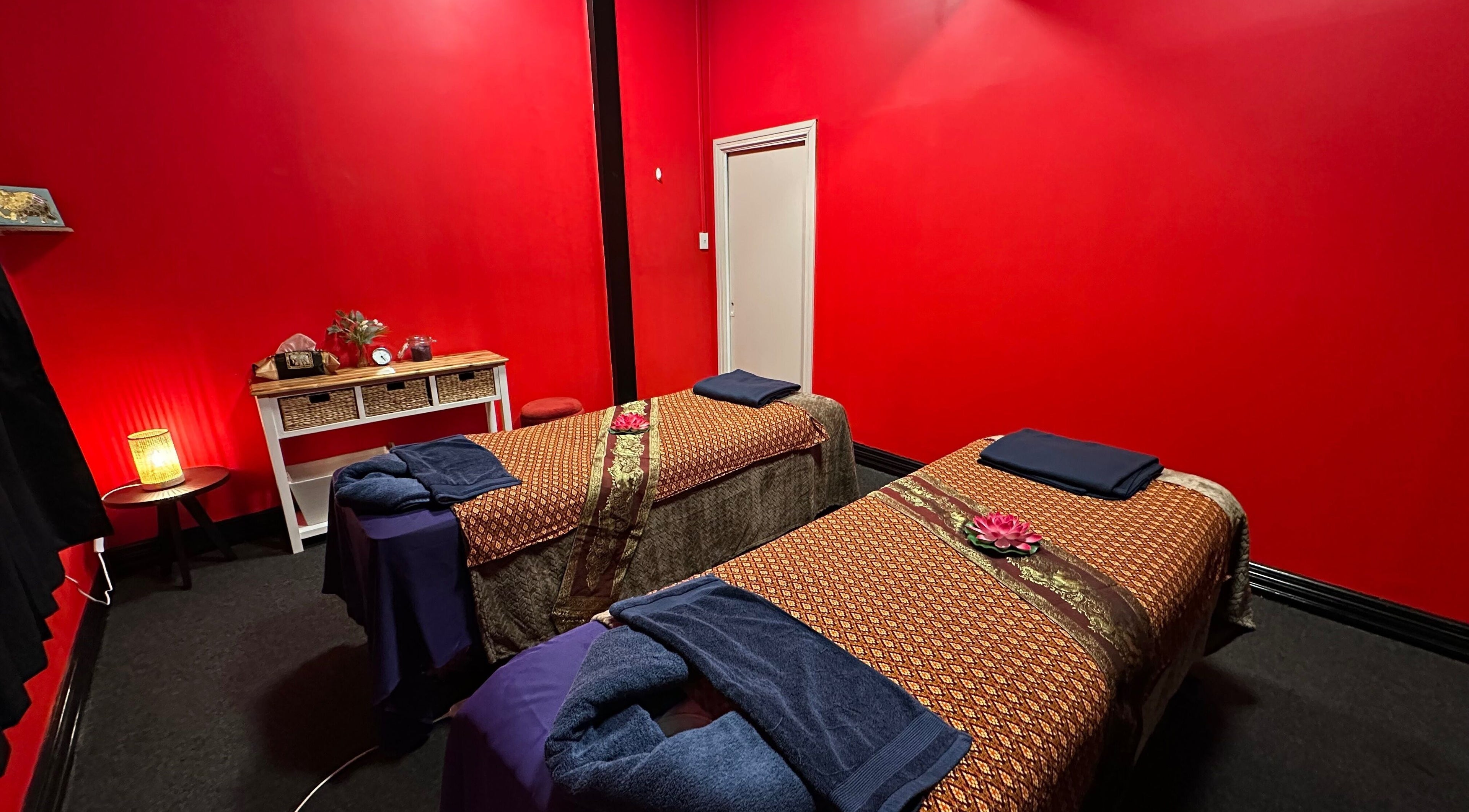 Serene massage room at Miramar 🌸 Amarin Thai Balinese Massage & Spa, Wellington, NZ with two massage tables.