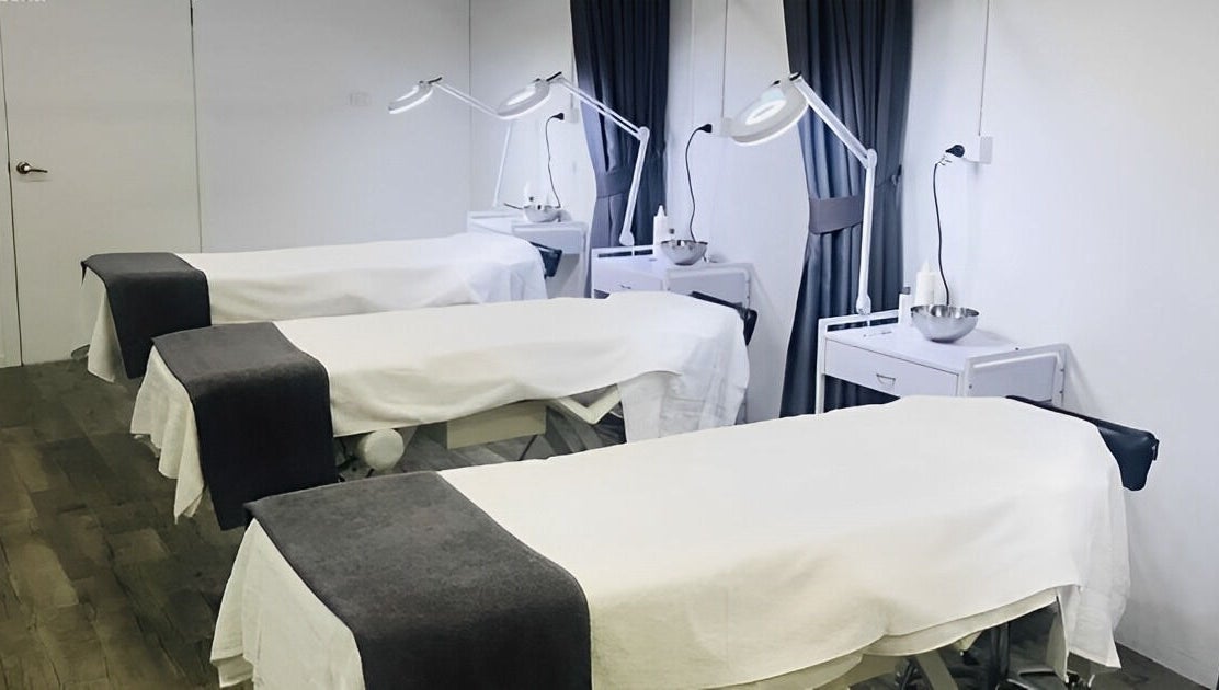 Spa treatment room with massage tables at Ccbt Student Salon, Melbourne, Victoria, AU, designed for relaxation.