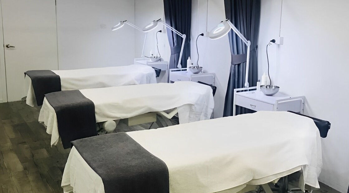 Spa treatment room with massage tables at Ccbt Student Salon, Melbourne, Victoria, AU, designed for relaxation.
