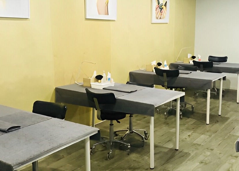 Polished nail station setup at Ccbt Student Salon, Melbourne, Victoria, AU. Modern and clean interior view.