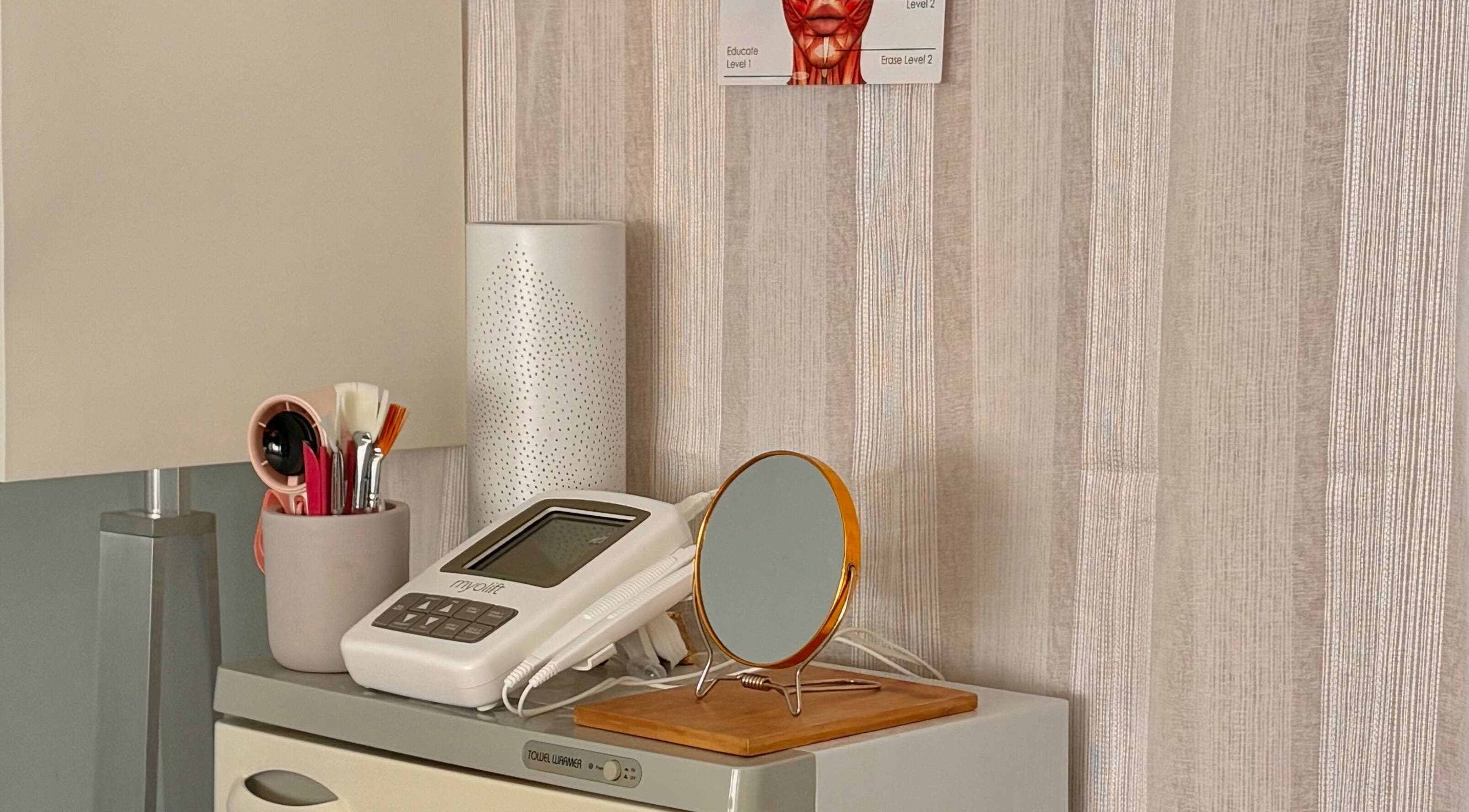 Reach Medspa & Manicures in Mississauga, Ontario, CA. Cozy counter with mirror and spa tools.