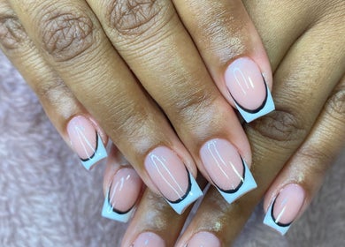 Stylish French manicure at Bkt Nails, Pretoria, Gauteng, ZA showcasing elegant nail art.