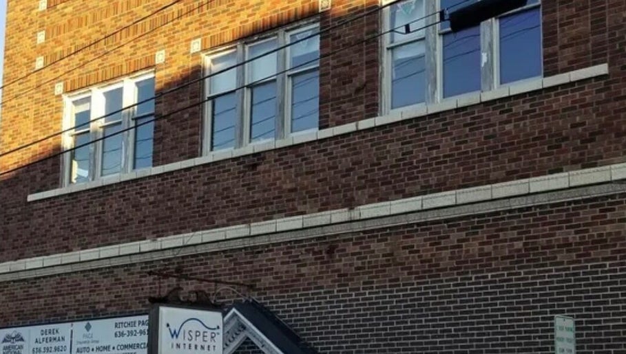 Endlessly Connected - Washington, MO, beautifully showcases a brick facade in Washington, Missouri, US.
