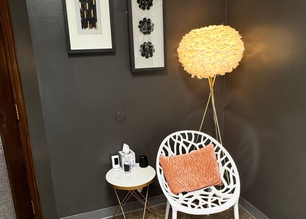 Inviting seating area at Endlessly Connected - Washington, MO, featuring artistic lamp and decor, Washington, Missouri, US.