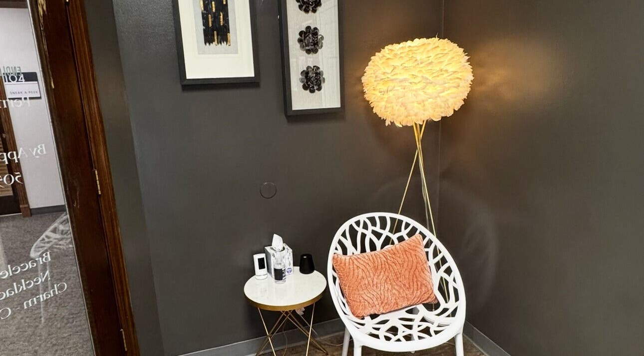 Inviting seating area at Endlessly Connected - Washington, MO, featuring artistic lamp and decor, Washington, Missouri, US.