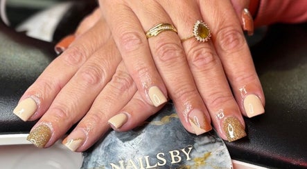 Elegant nail art at Kacey Lee Nails & Beauty, Gorseinon, Wales, GB with gold accents.