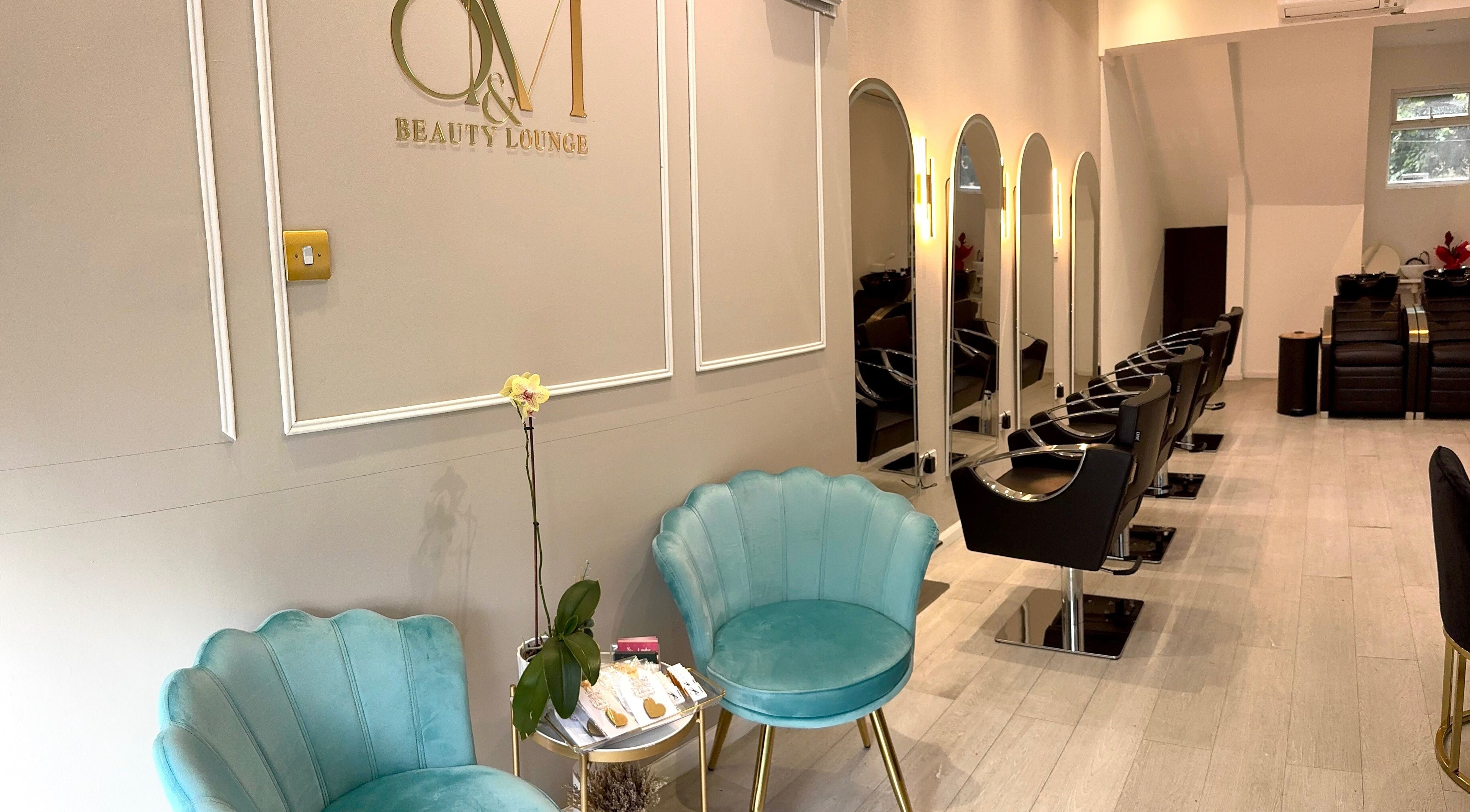 Chic interior view of S&M Beauty Lounge in London, England, GB with stylish seating and beauty stations.