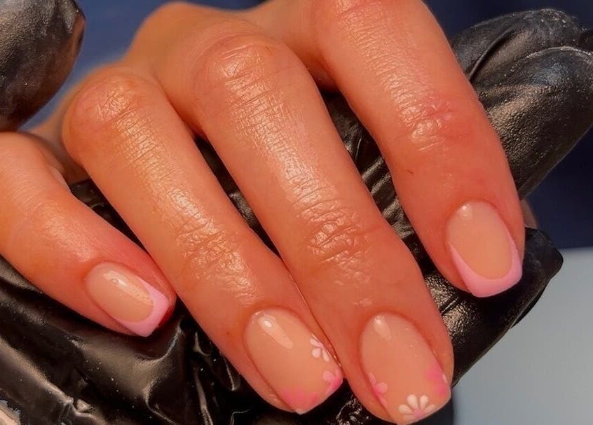 Beautiful floral French manicure at Nails By Els, Busby, Scotland, GB. Perfect fusion of elegance and style.