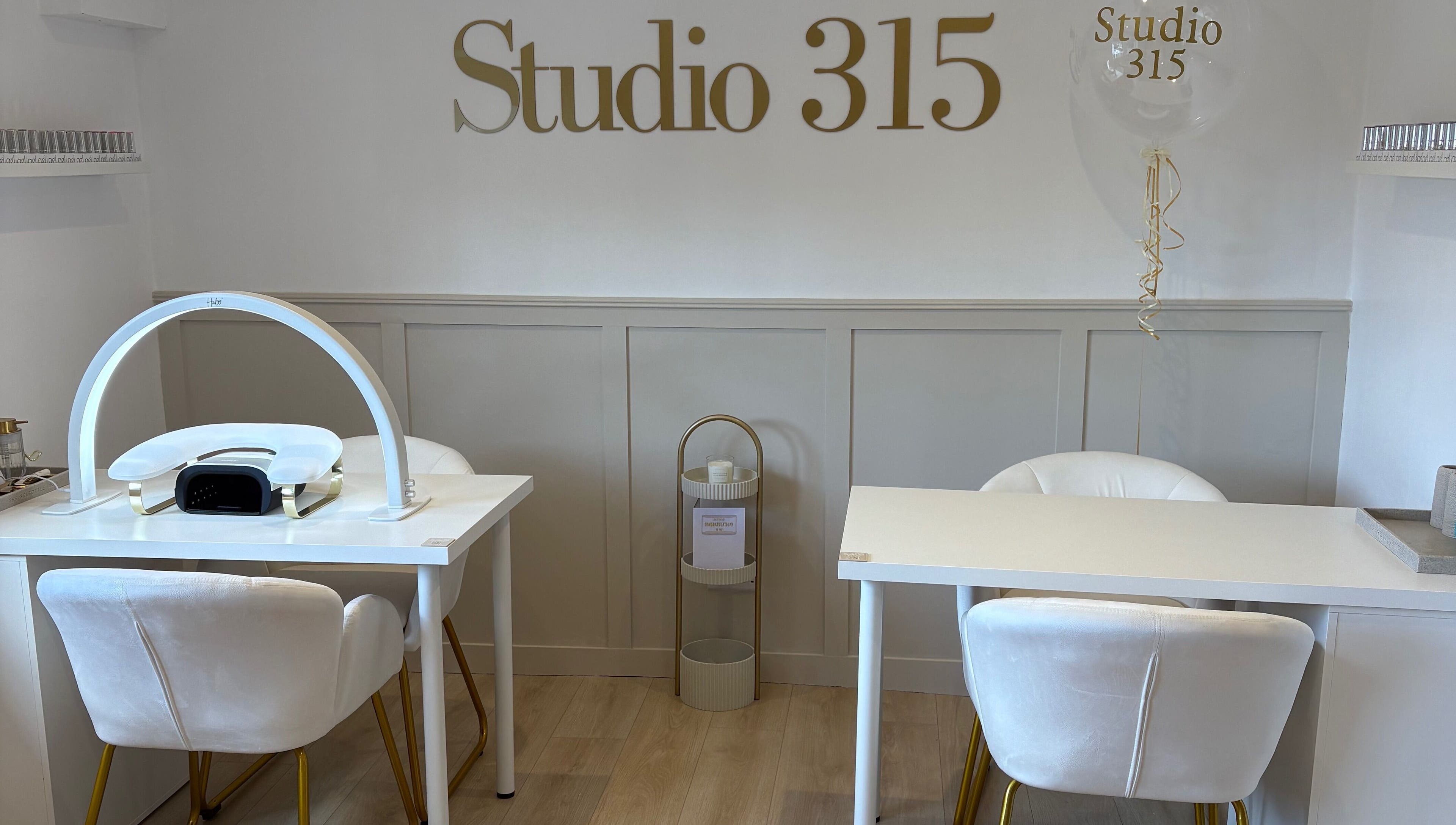 Elegant nail salon at Nails By Els, Busby, Scotland, GB with modern decor and cozy seating.