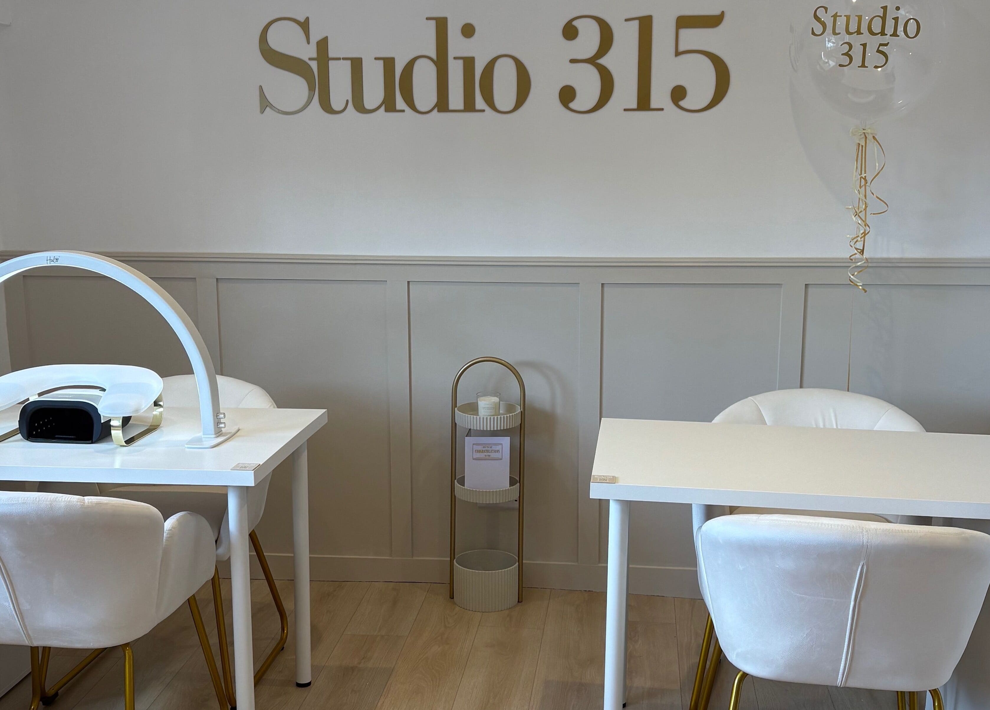 Elegant nail salon at Nails By Els, Busby, Scotland, GB with modern decor and cozy seating.