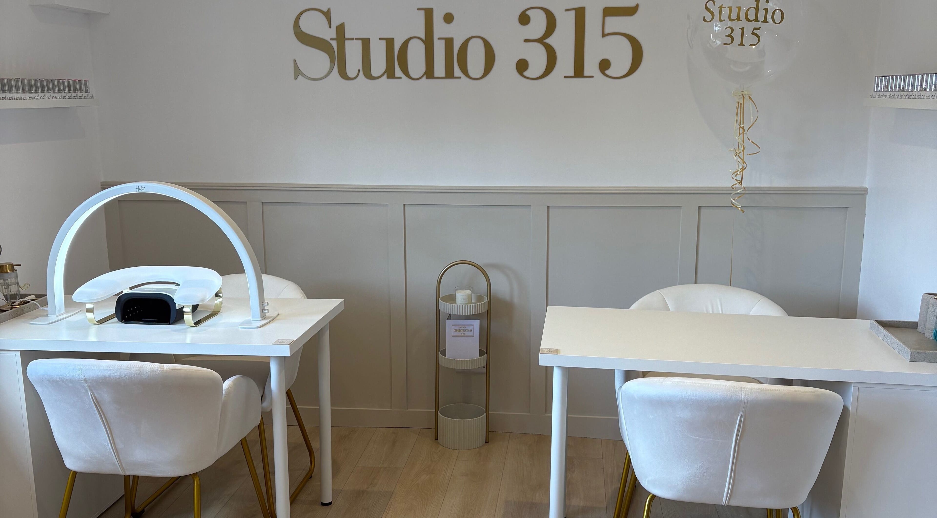 Elegant nail salon at Nails By Els, Busby, Scotland, GB with modern decor and cozy seating.