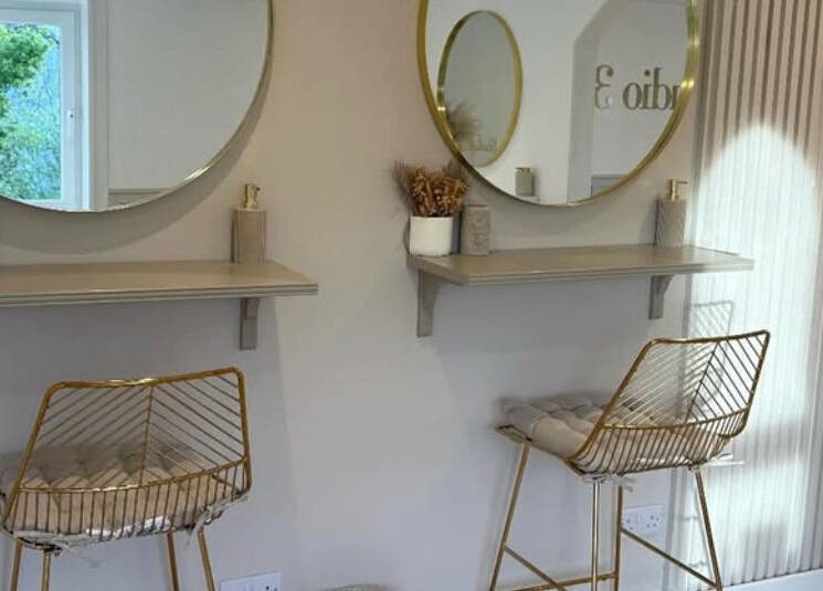 Chic styling mirrors with gold chairs at Nails By Els, Busby, Scotland, GB beauty venue.