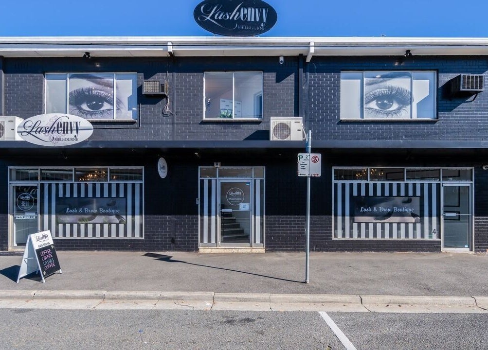 Exterior view of Lash Envy | Oakleigh, a sleek black building in Oakleigh, VIC, AU, offering lash and beauty services.