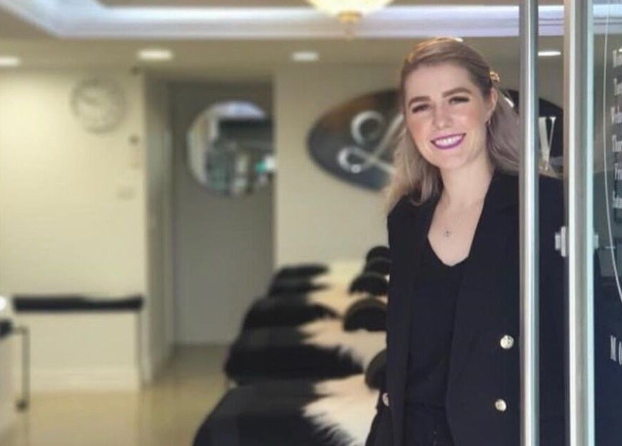 Welcoming atmosphere at Lash Envy | Berwick in Berwick, VIC, AU with staff member smiling by the entrance.