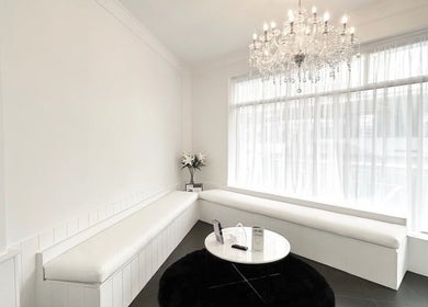Elegant waiting area at Lash Envy | Geelong with chandelier in Geelong West, Victoria, AU.
