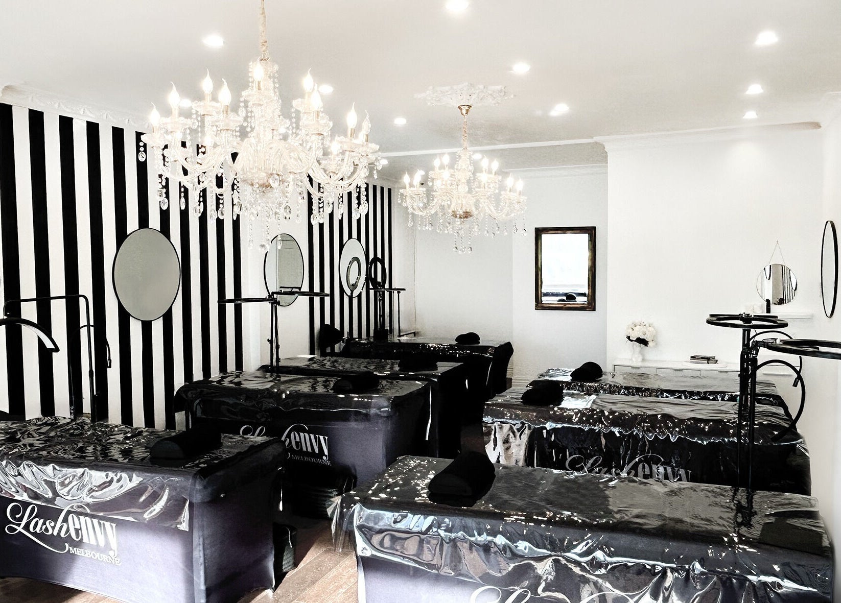 Elegant interior of Lash Envy | Hampton, featuring stylish treatment beds and mirrors in Hampton, VIC, AU.