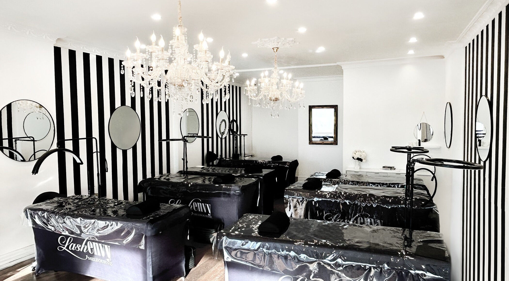 Elegant interior of Lash Envy | Hampton, featuring stylish treatment beds and mirrors in Hampton, VIC, AU.
