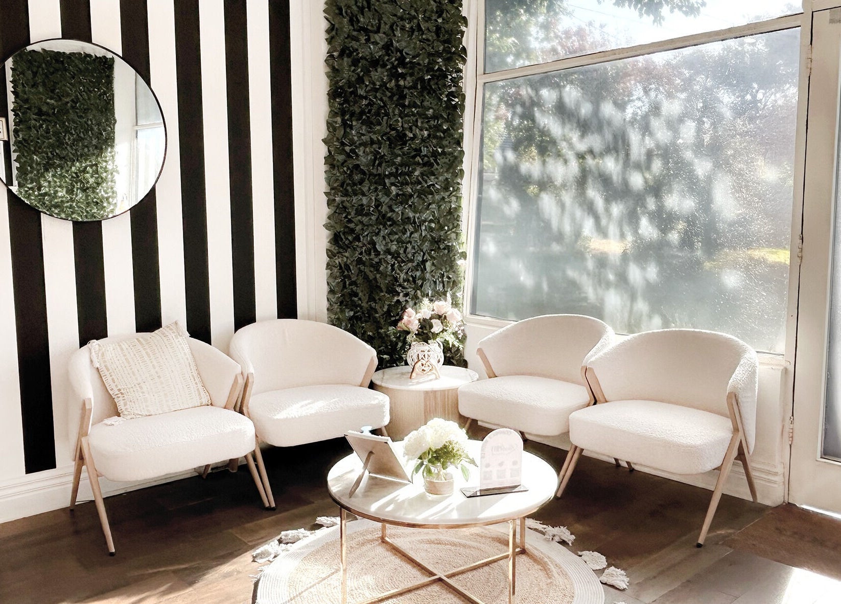 Chic, cozy waiting area at Lash Envy | Hampton, located in Hampton, VIC, AU, with stylish chairs and decor.